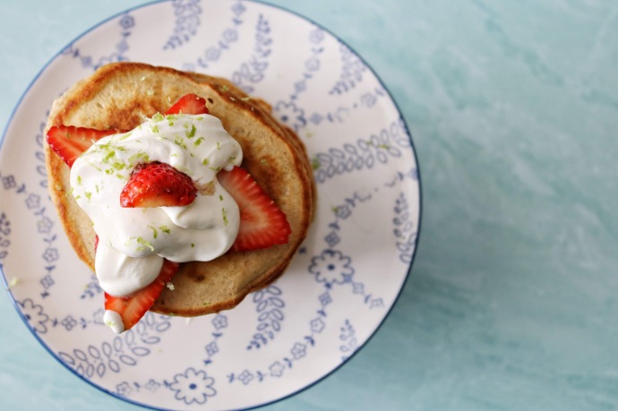 Cardamom pancakes with balsamic strawberries & limey labne whipped cream.
